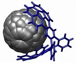 A fullerene bound in a buckycatcher through aromatic stacking interactions.[8]