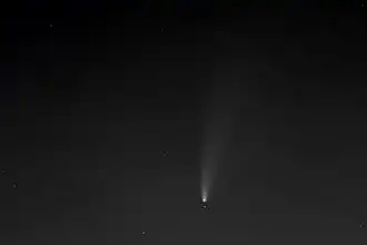 Talitha Borealis in conjunction with the comet C/2020 F3 (NEOWISE) on 18&nbsp;July 2020 21:30 UTC with an attitude von 17° above the north horizon of Berlin (image height = 4°). At the lower edge of the picture, a bit left from the centre there is the neighbour star Alkaphrah (Kappa Ursae Majoris respectively Talitha Australis). The distance between Talitha Borealis and C/2020 F3 was seven arc minutes.