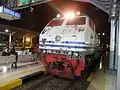CC20302 locomotive train arriving at Bandung Station with the logo of Ministry of Transportation