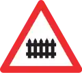1.15 Level crossing with a railway with barrier or gate[note 3]