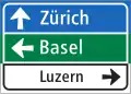 4.35 Signpost in table format (indicating direction to Zürich on main route, to Basel via motor-/expressway, and to Luzern on minor route)