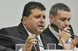 Ribeiro speaking at a Parliamentary Commission of Inquiry conference in 2015