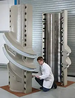 Suspender cable saddle for the new SAS span