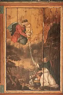 Panel 5 – The prayer of the Rosary.