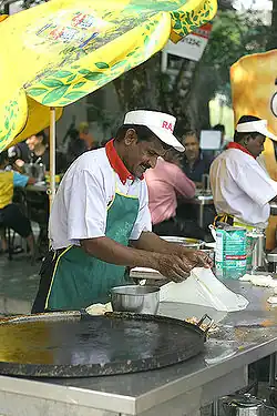Another picture of roti canai preparation