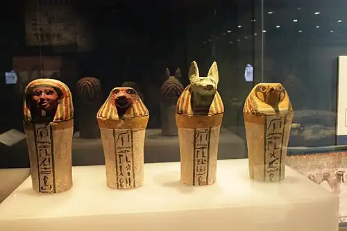 Complete set of canopic jars decorated with hieroglyphics; 744–656&nbsp;BC; painted sycomore fig wood; various heights; British Museum (London)