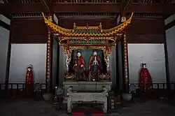 Interior view of the back hall, with the statue of Cao'e's parents in a pavilion, flanked by statues