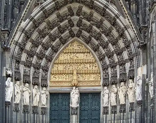 The main entrance shows the 19th century decoration.