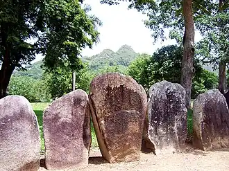 Stones and mountain behind