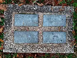 Funeral plaques arranged in groups of four