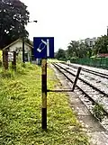 One of the old stands for receiving the key token remains at Bukit Timah railway station in July 2012