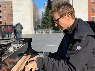 Huggins playing piano in Washington Square Park in January&nbsp;2019