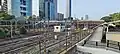 Northward view of the stations from Elphinstone Rd. Bridge, east side