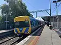 A Flinders Street-bound Comeng train arrives at Platform 1, November 2024
