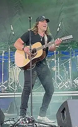 Marks performing in Burlington, Ontario, in 2023