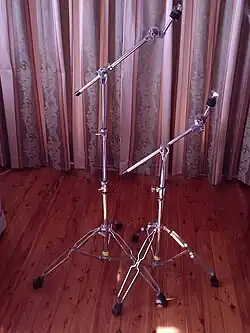 Simple boom stands. The rightmost one is specially configured to support a ride cymbal.