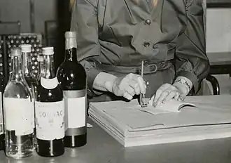 Stamping a "motbok" (with alcohol purchases shown on left) in 1955