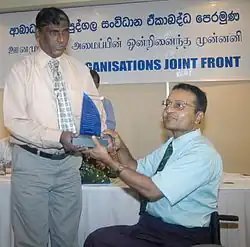 Felicitation – The Disability Organisations Joint Front Sri Lanka (DOJF) presented Perera with a special plaque at a felicitation ceremony held at Hotel Renuka Colombo on Saturday 11 June 2010, in appreciation of his outstanding contributions promoting Social Inclusion for All.