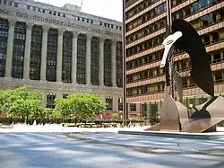 Richard J. Daley Center and Daley Plaza is Chicago's premier civic center and features a massive sculpture by Pablo Picasso. The modernist skyscraper courthouse is behind the sculpture and to the left is City Hall-County Building
