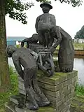 Peat workers statue