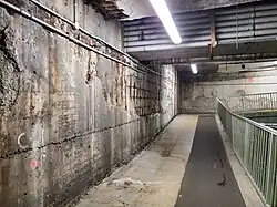 Decaying section of the parking deck beneath the plaza, subject to upcoming repairs.