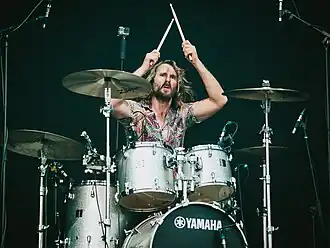 Hamish Rosser performing with Wolfmother at Deichbrand Festival in 2018