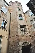 Gothic tower with Renaissance door.
