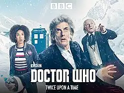 A snowy landscape. Top text: BBC; Bottom text: BBC, DOCTOR WHO, TWICE UPON A TIME. From left to right Pearl Mackie, Peter Capaldi, David Bradley.