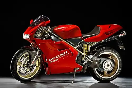 Ducati 748 with carbon fiber fenders and exhaust.