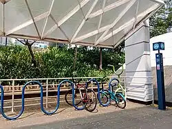 Bike racks located in front of the MRT stop entrance