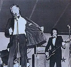 Jacques Dutronc on stage in 1971 with bassist Noël Mirol