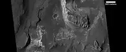 Layered butte in Aureum Chaos, as seen by HiRISE under HiWish program.