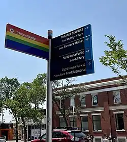 Pride Corner street sign on the corner of Whyte Avenue and 104 Street in Edmonton, Alberta. (May 2022)