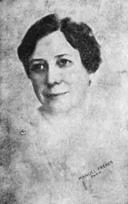 A white woman with dark hair, portrait stamped "Manuel Freres Paris"