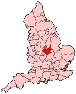 A small county slightly, located in the centre of a country. It is completely bounded by other counties.