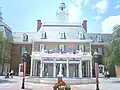 The American Adventure pavilion in Epcot, also in Walt Disney World, uses forced perspective to make a five-story building appear to be two and a half stories.[24]