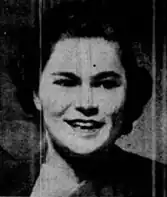 A newspaper photograph of a young smiling white woman with short dark hair, from 1948.