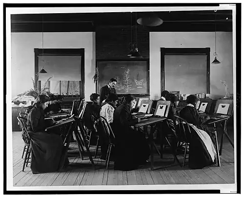 Frances Benjamin Johnston, Leigh Richmond Miner Teaching Drawing at Hampton, 1900.