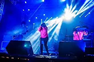 The band in May 2017. From left to right: Rafael Brasil, Emmily Barreto, Lauro Kirsch and Cris Botarelli. Eduardo Figueira is not shown.