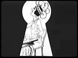 Felix peeping through the keyhole at Gloria Swanson