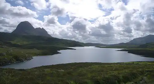 Fionn Loch and Suilven Fionn Loch and the prominent hill of Suilven lie south east of the coastal village of Lochinver in the Assynt area