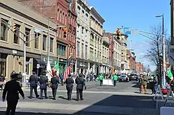 Flag carrying officers of the Holyoke Police Dept. leading the Saint Patrick's Parade, 2019