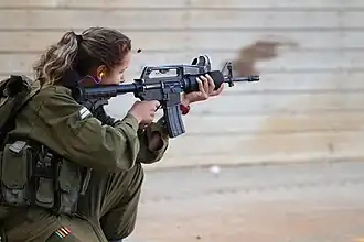 Female combat soldier during the IDF Combat Fitness Competition, 2010