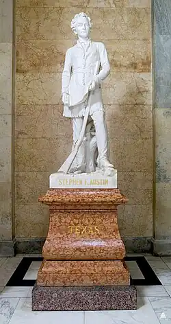 Marble statue of Stephen F. Austin on a stone pedestal