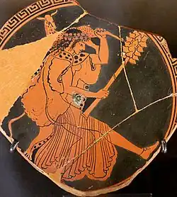 Maenad carrying a hind, fragment of an Attic red figure cup c. 480 BC, Louvre Museum.