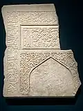 Fragmentary tombstone in the shape of a mihrab. Samarkand, 1385-1400. Louvre Museum OA 4080.[59]