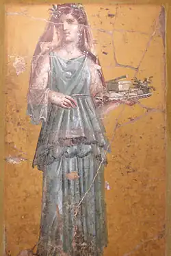 Fresco of woman with tray