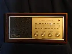 The front of a National Panasonic Model RE-784A with a walnut veneer