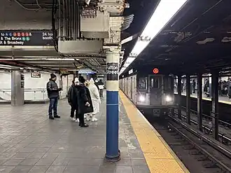 A "4" train at the Fulton Street station on the IRT Lexington Avenue Line