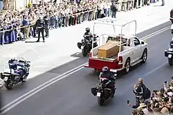 The pope's coffin being transported for the burial